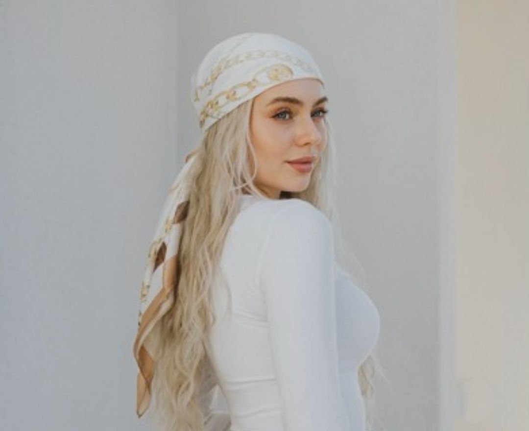 Blonde Model Wearing a Tie Ur Knot Scarf
