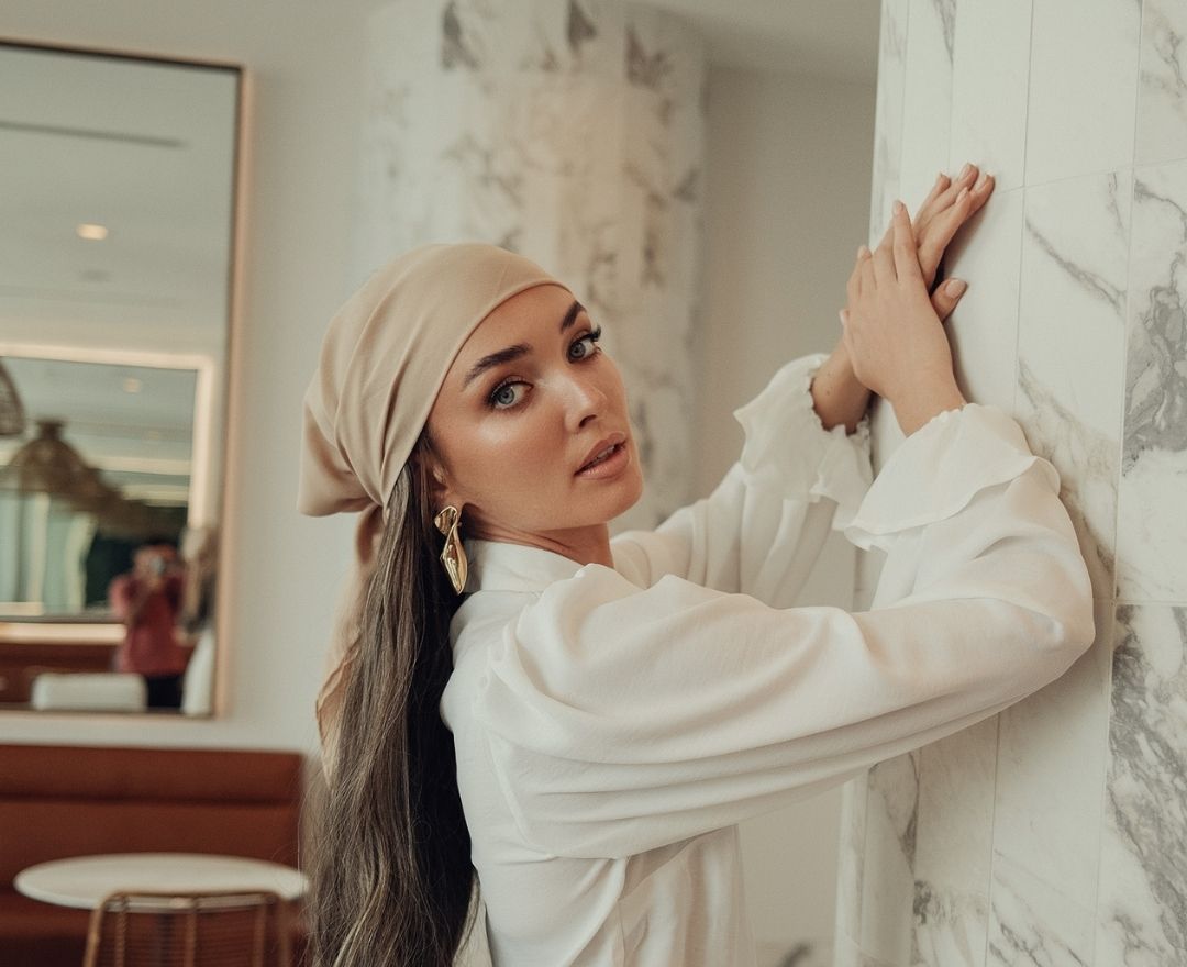 Model Wearing a Tie Ur Knot Headscarf