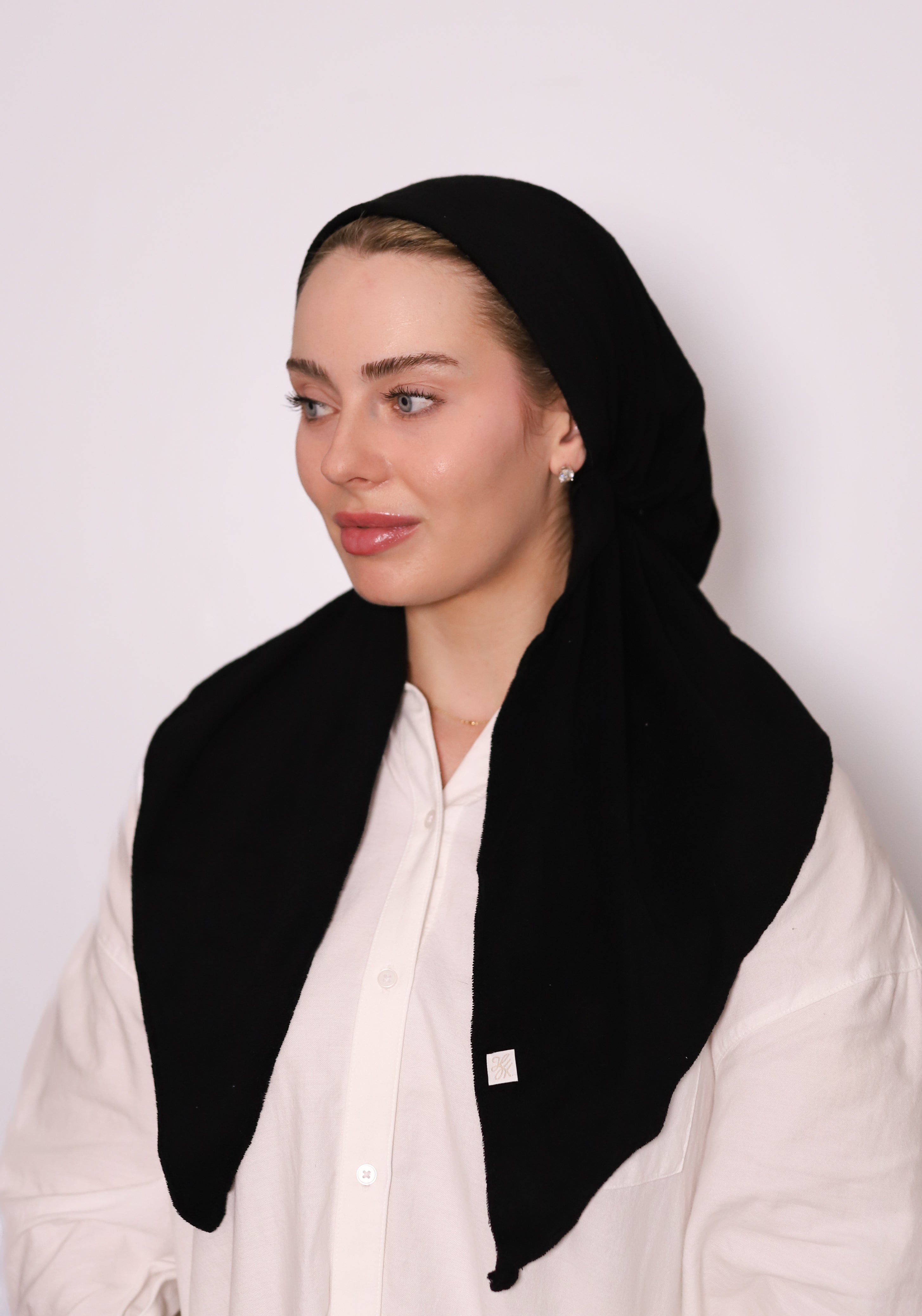 Black Terry Head Scarf in soft terry fabric with long ties, styled as a modest swim headscarf for secure, elegant coverage.