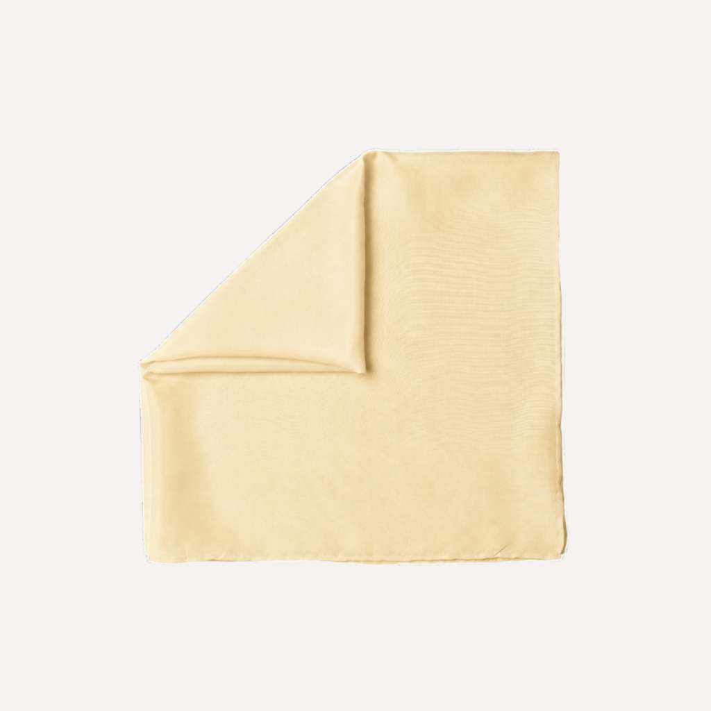 Butter Yellow Solid Head Scarf by TUK in a soft pastel yellow shade with smooth lightweight fabric and an elegant flowing drape.