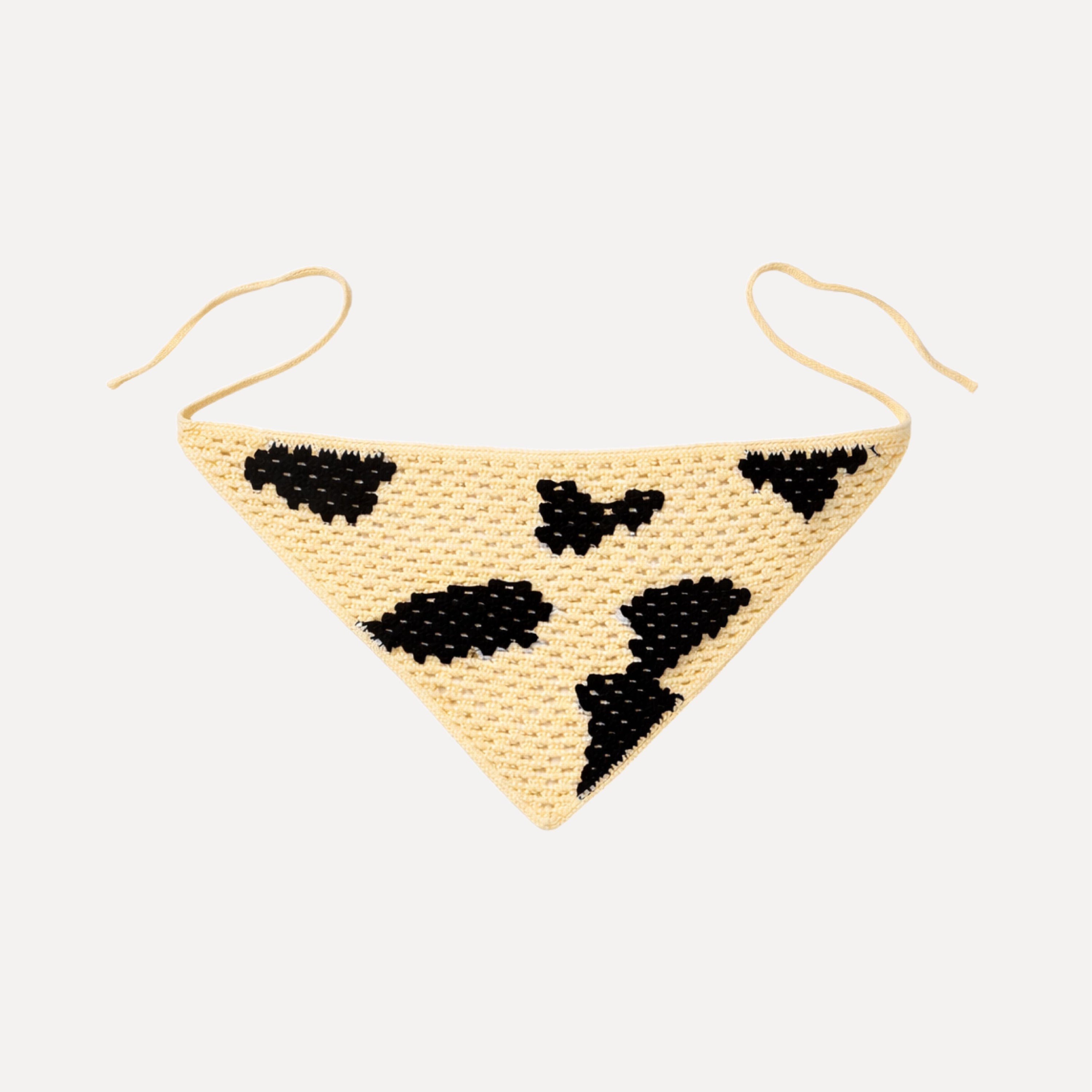 TUK Calf Hair Crochet Bandana with cow print design in black and cream, handmade boho western style tie-up headscarf accessory.