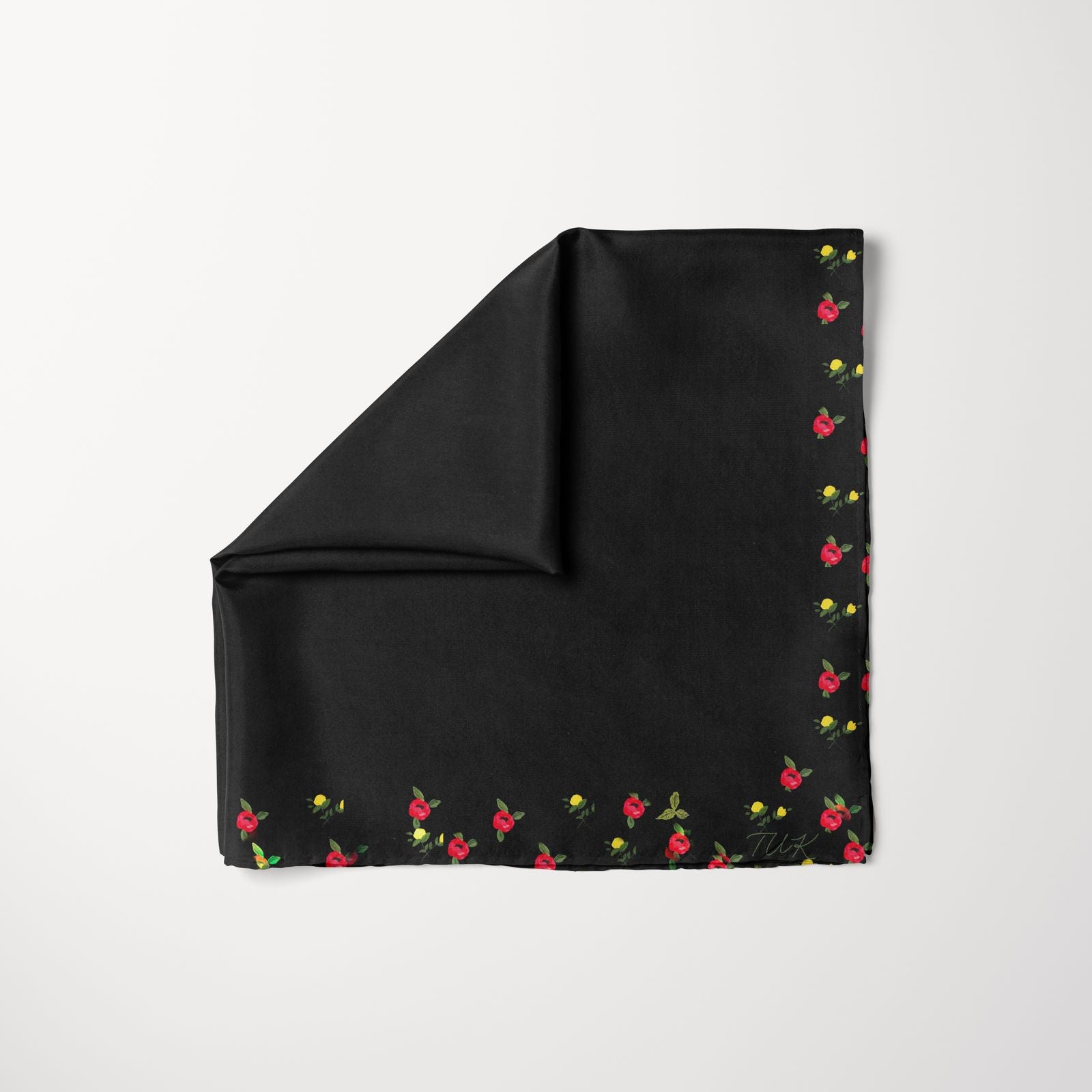 TUK Centerfold Head Scarf in black with delicate red and yellow floral border design, elegant and versatile accessory.