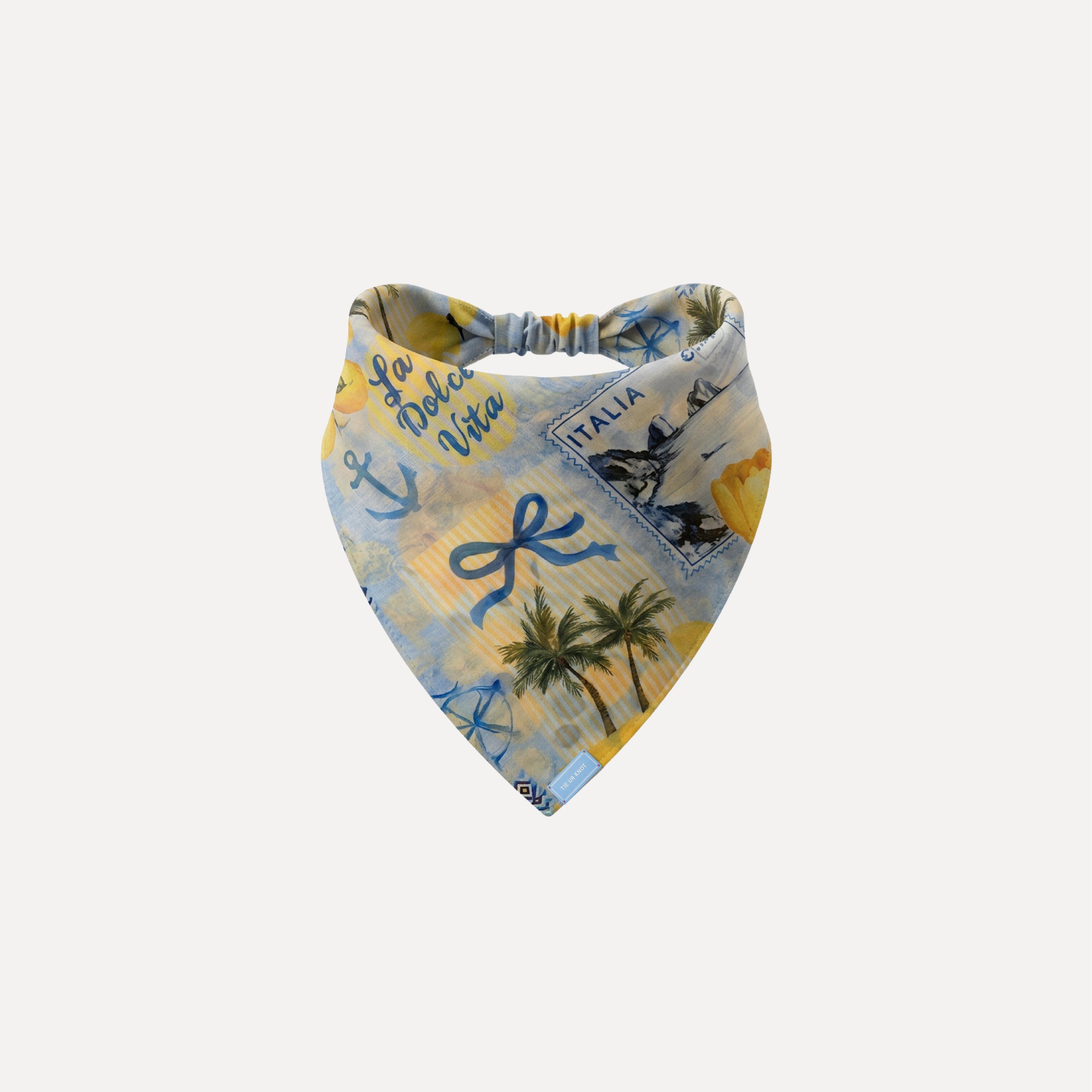 Blue and yellow Italian coastal themed headband bandana with palm trees, lemons, and ‘La Dolce Vita’ design.