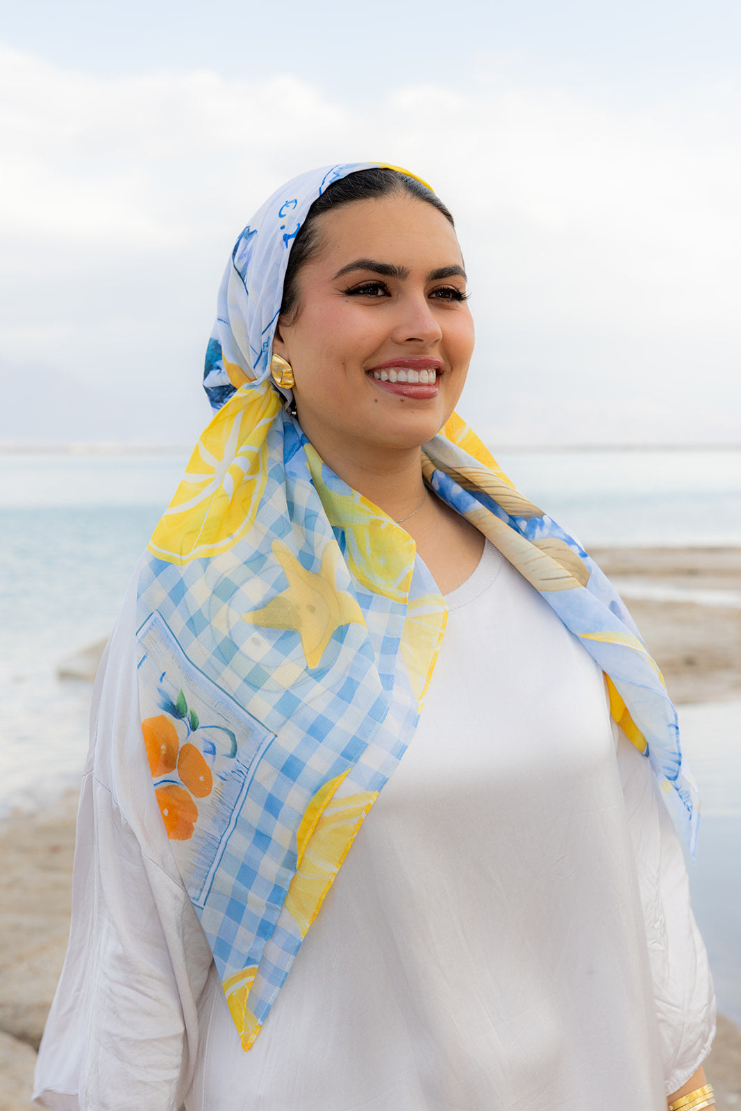 Ciao For Now Head Scarf by TUK featuring a blue gingham, citrus and starfish print, styled seaside for a fresh coastal look.