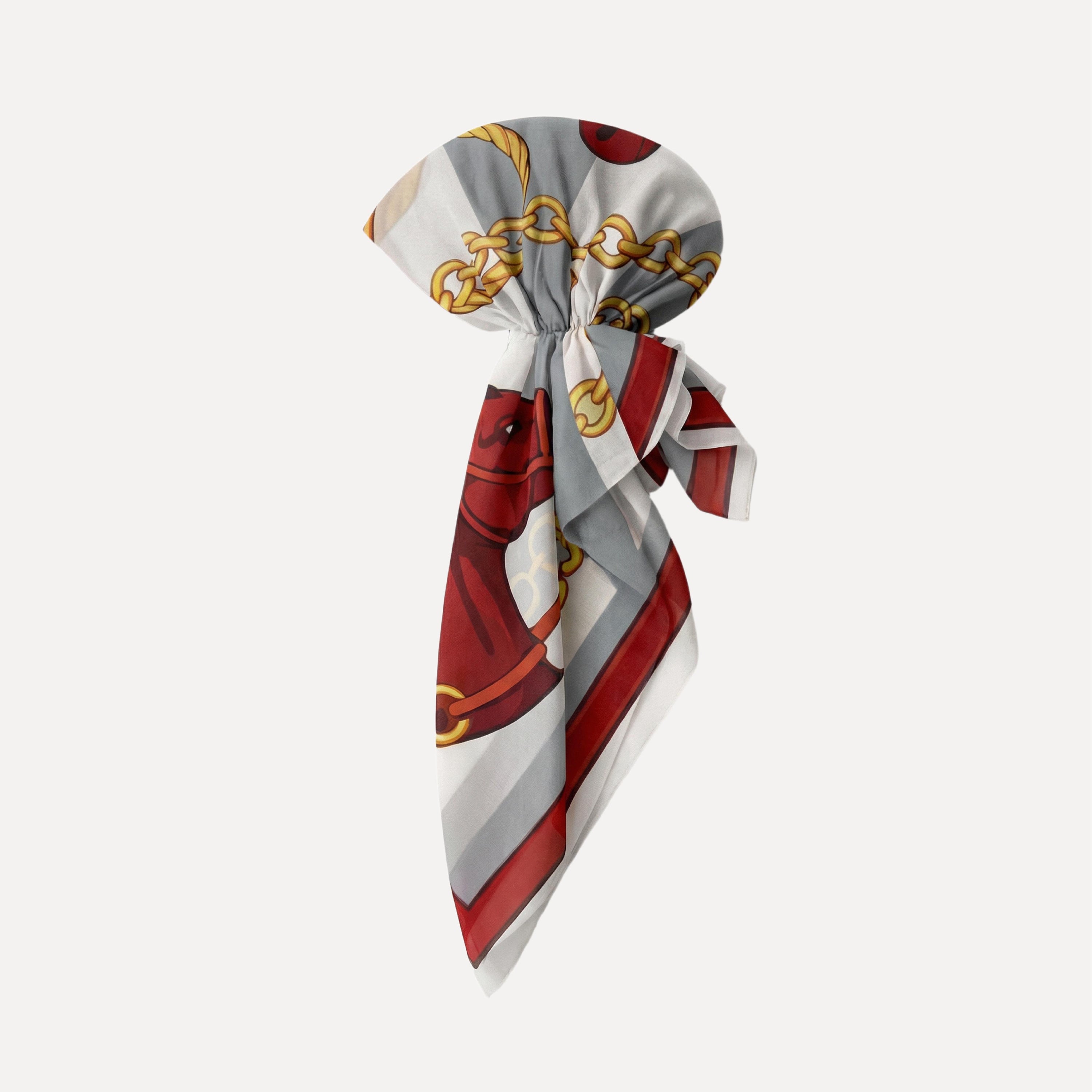 TUK Cool Reins Pre-Tie headscarf in silk with red, gray, and gold chain print, elegant pre-tied head wrap scarf with equestrian inspired design.