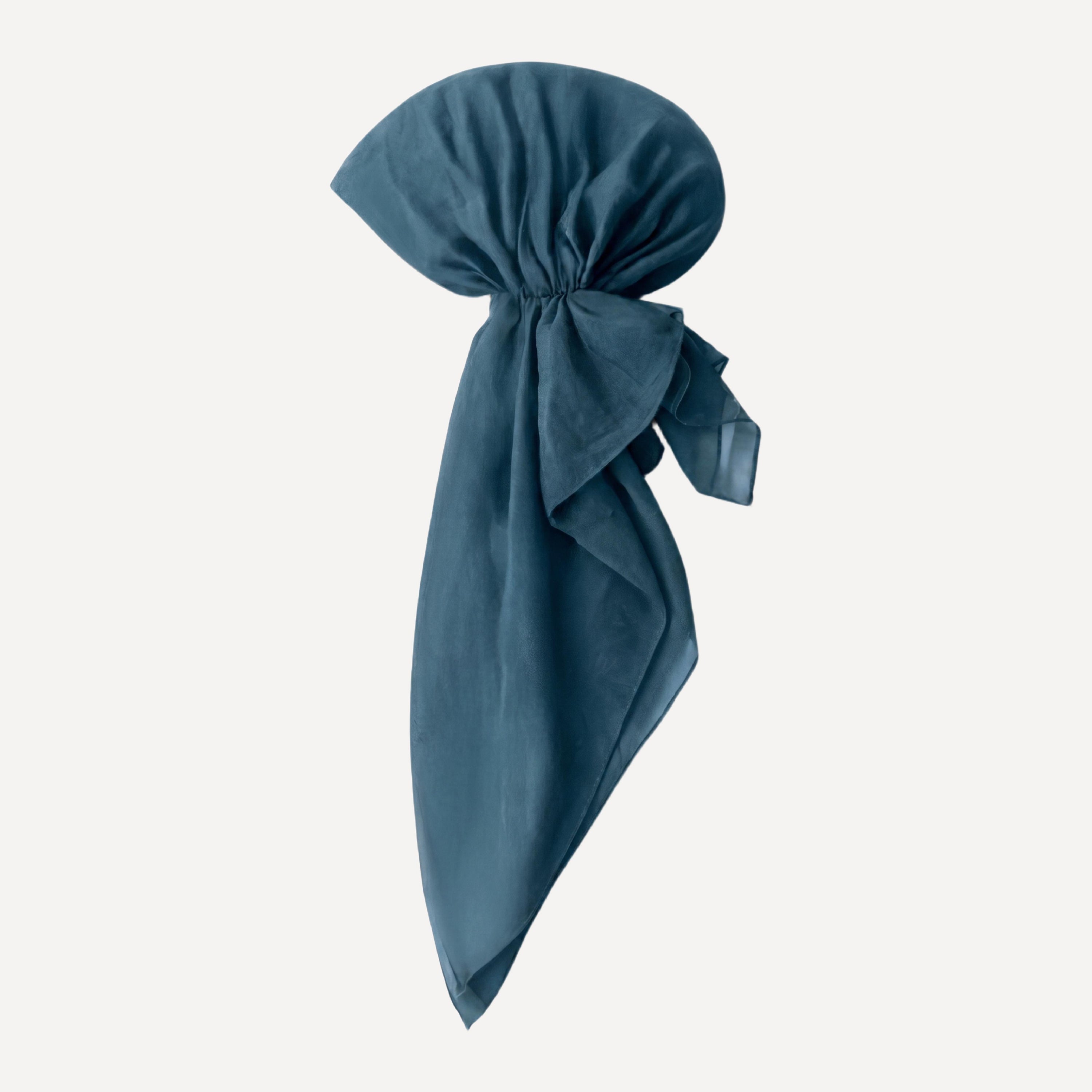 Deep Teal Solid Head Scarf by TUK styled in a pre-tied wrap, featuring a rich teal hue and elegant flowing drape.