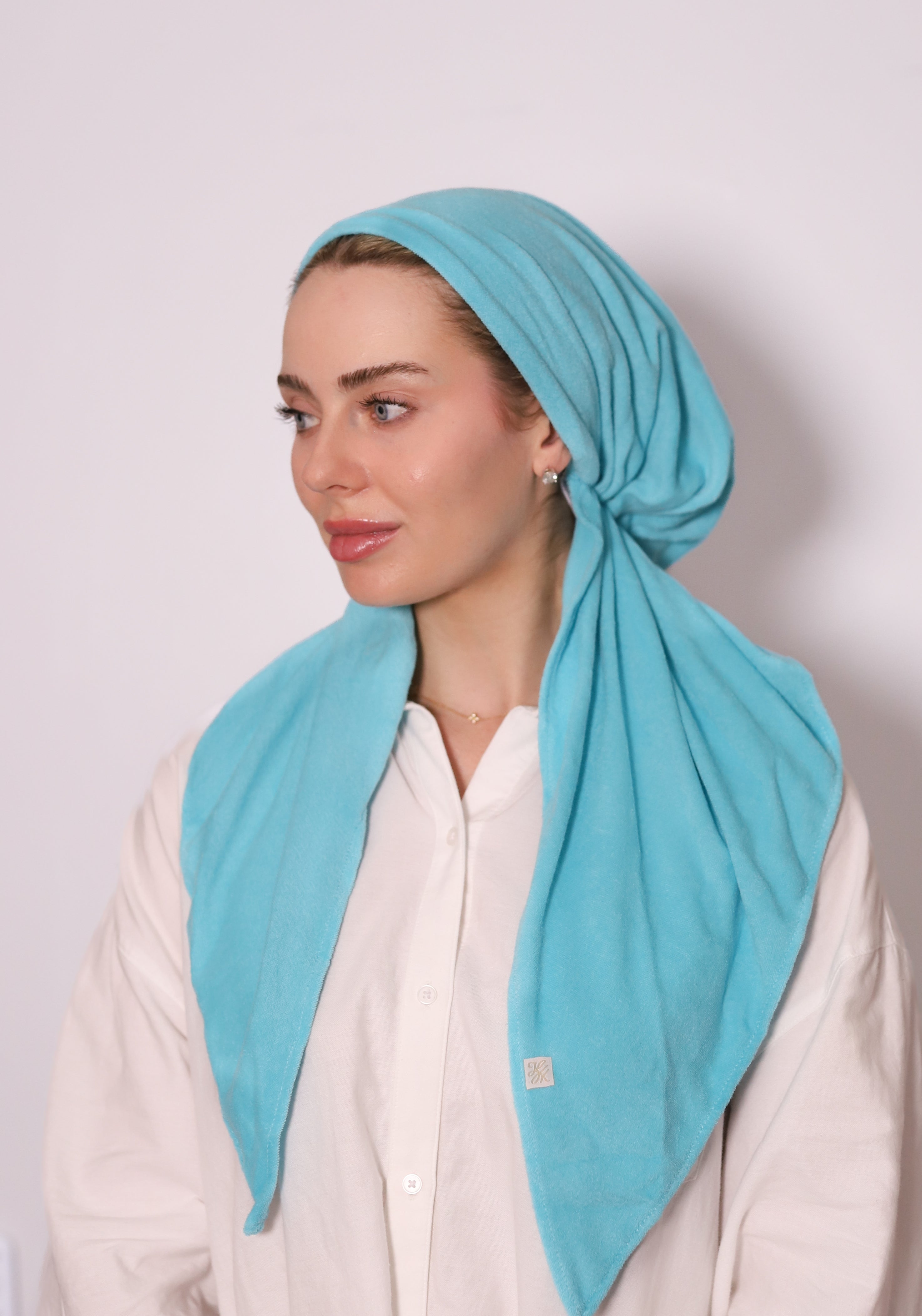 Electric Blue Terry Head Scarf by TUK in soft absorbent terry fabric, styled in a chic wrap design with a vibrant blue finish.
