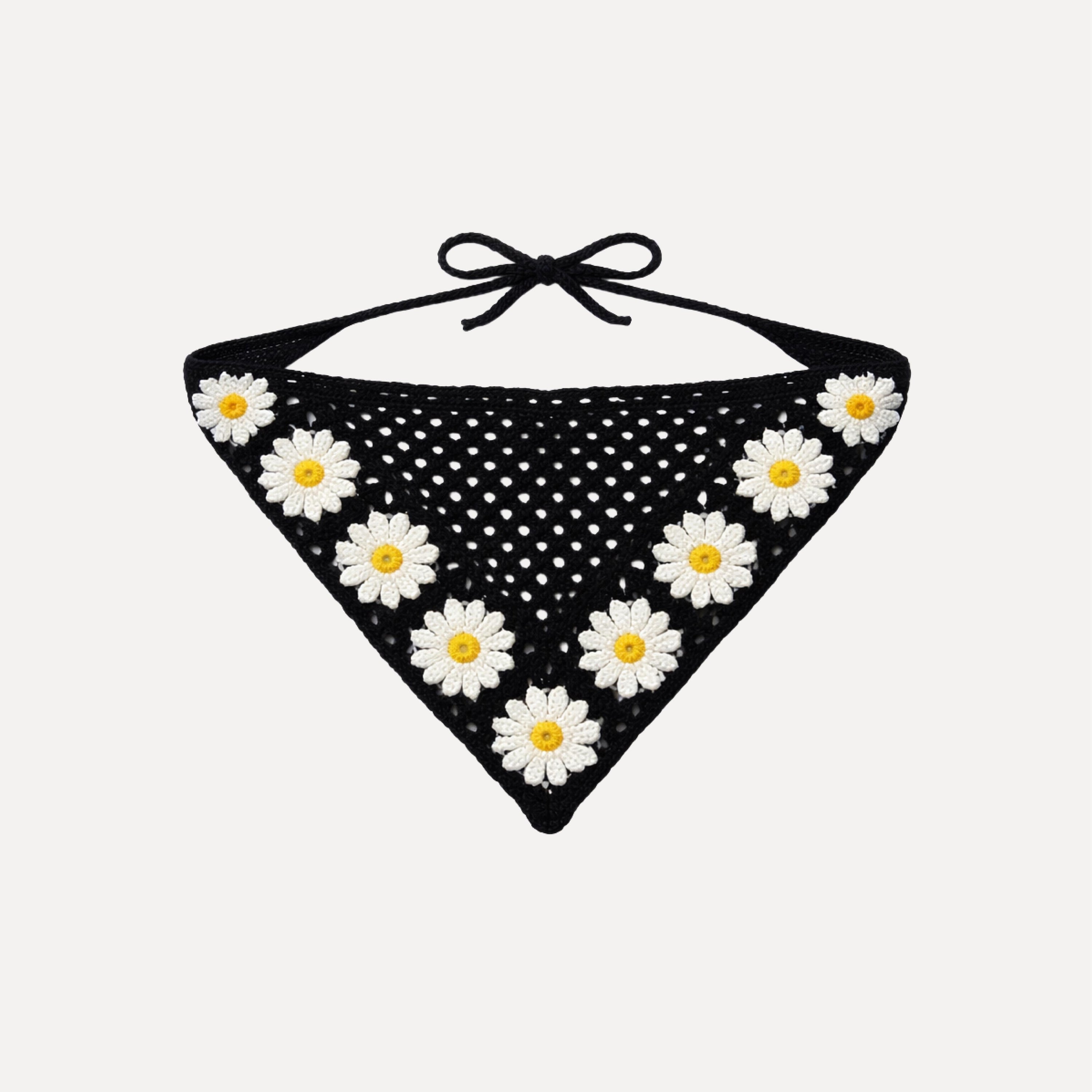 Black crochet triangle bandana with white daisy flowers, handmade Fleur Crochet Bandana by TUK, boho floral hair accessory.