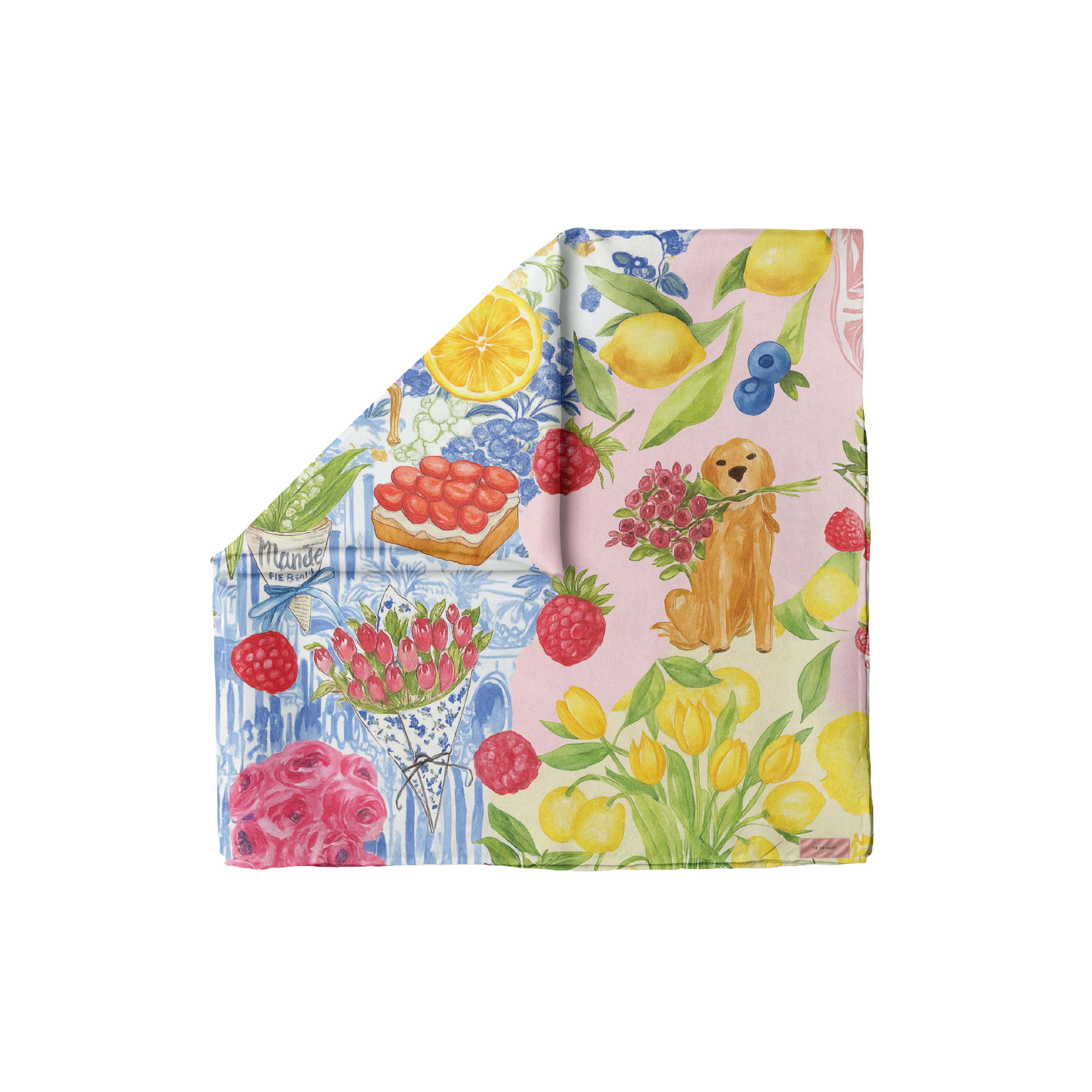 TUK Fleurs & Citrons head scarf with vibrant lemons, berries, florals, and playful dog illustration in colorful patchwork design.