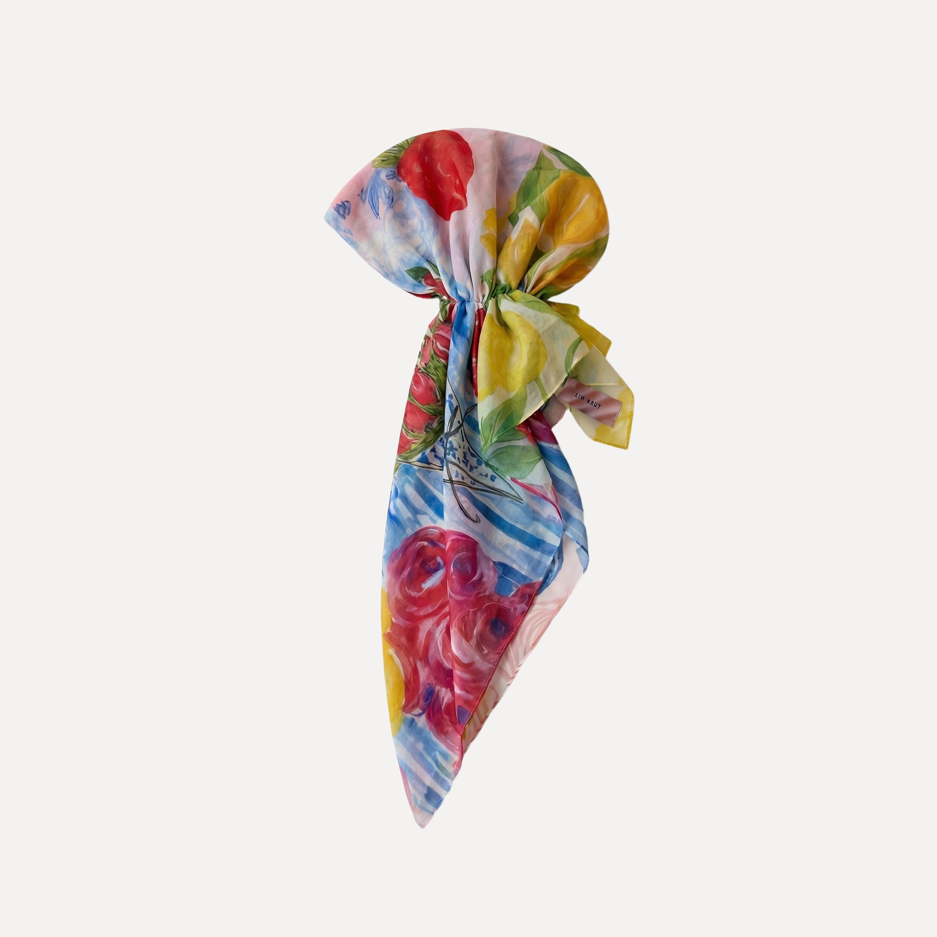 TUK Fleurs & Citrons pre-tied head scarf with colorful lemon, floral and fruit print in a soft, elegant wrap style accessory.