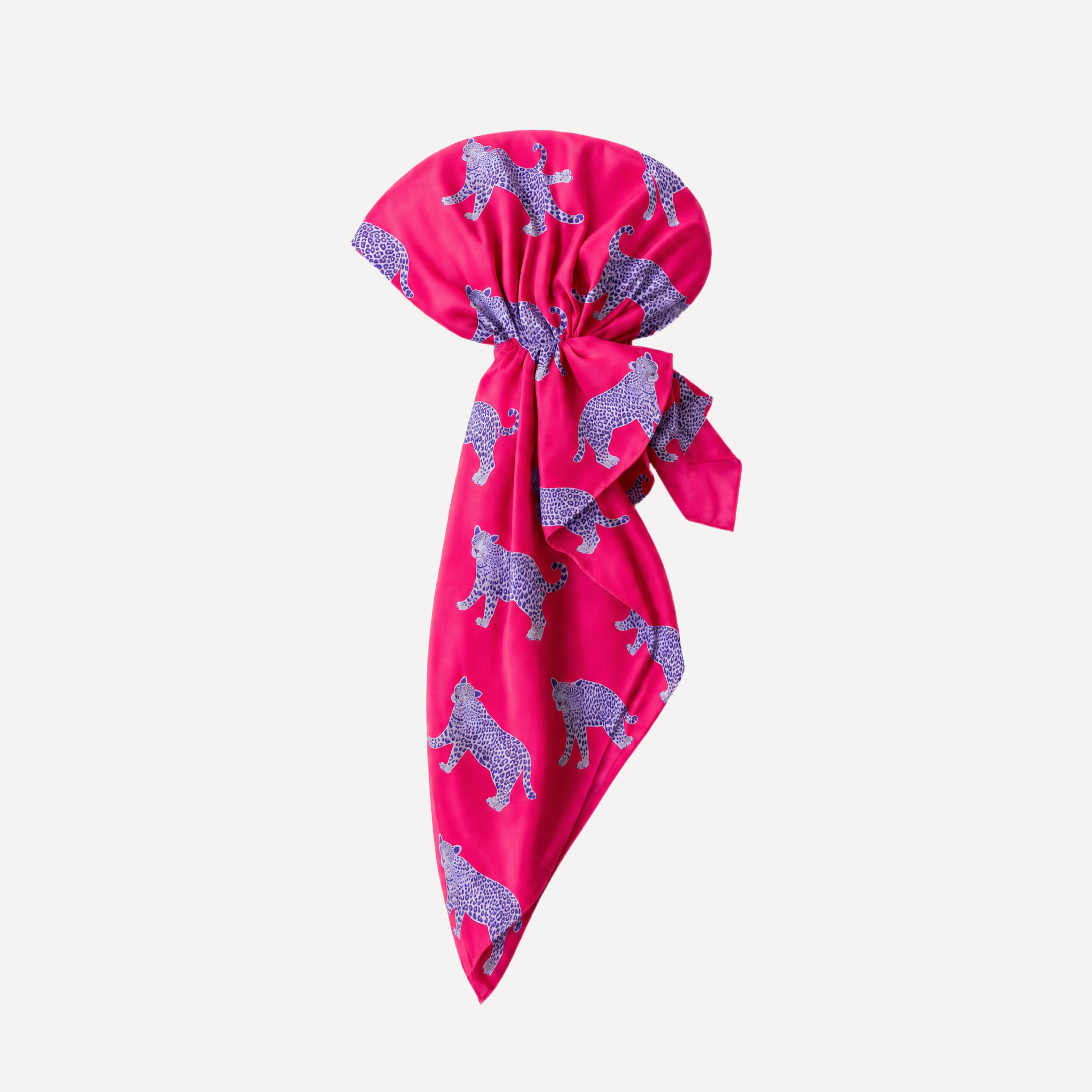 TUK Fuchsia Swim Head Scarf in pink satin with elegant leopard print design styled as a chic luxury poolside accessory.
