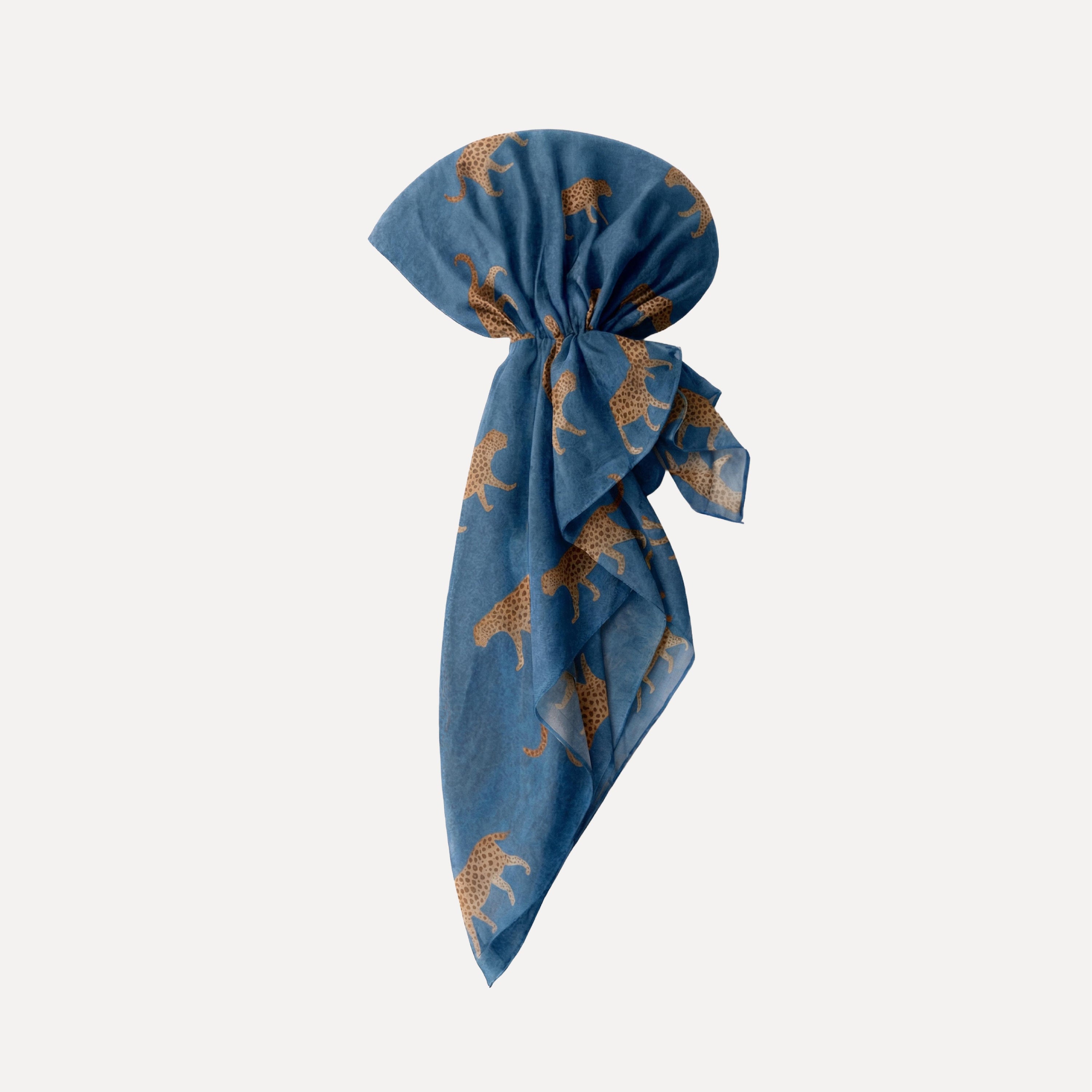 Haute Pursuit Head Scarf by TUK in blue with gold leopard print, pre-tied stylish headscarf for chic, elegant everyday wear.
