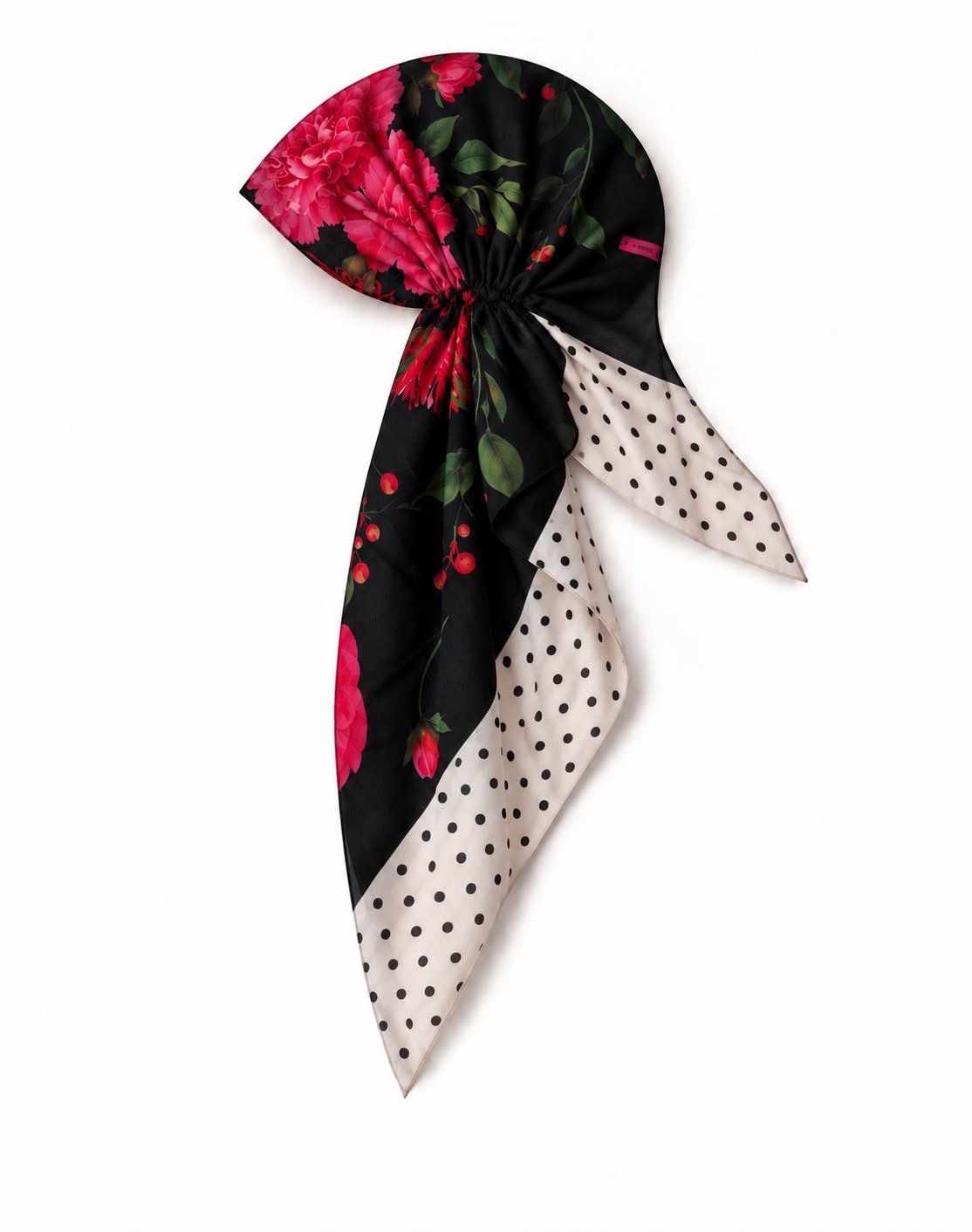 TUK In Full Swing Head Scarf in a pre-tied style with bold pink florals on black and a cream polka dot border with long tails.