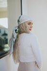 The light ivory base enhances the hand-illustrated look of the floating wings, bringing ethereal charm to your styling. 