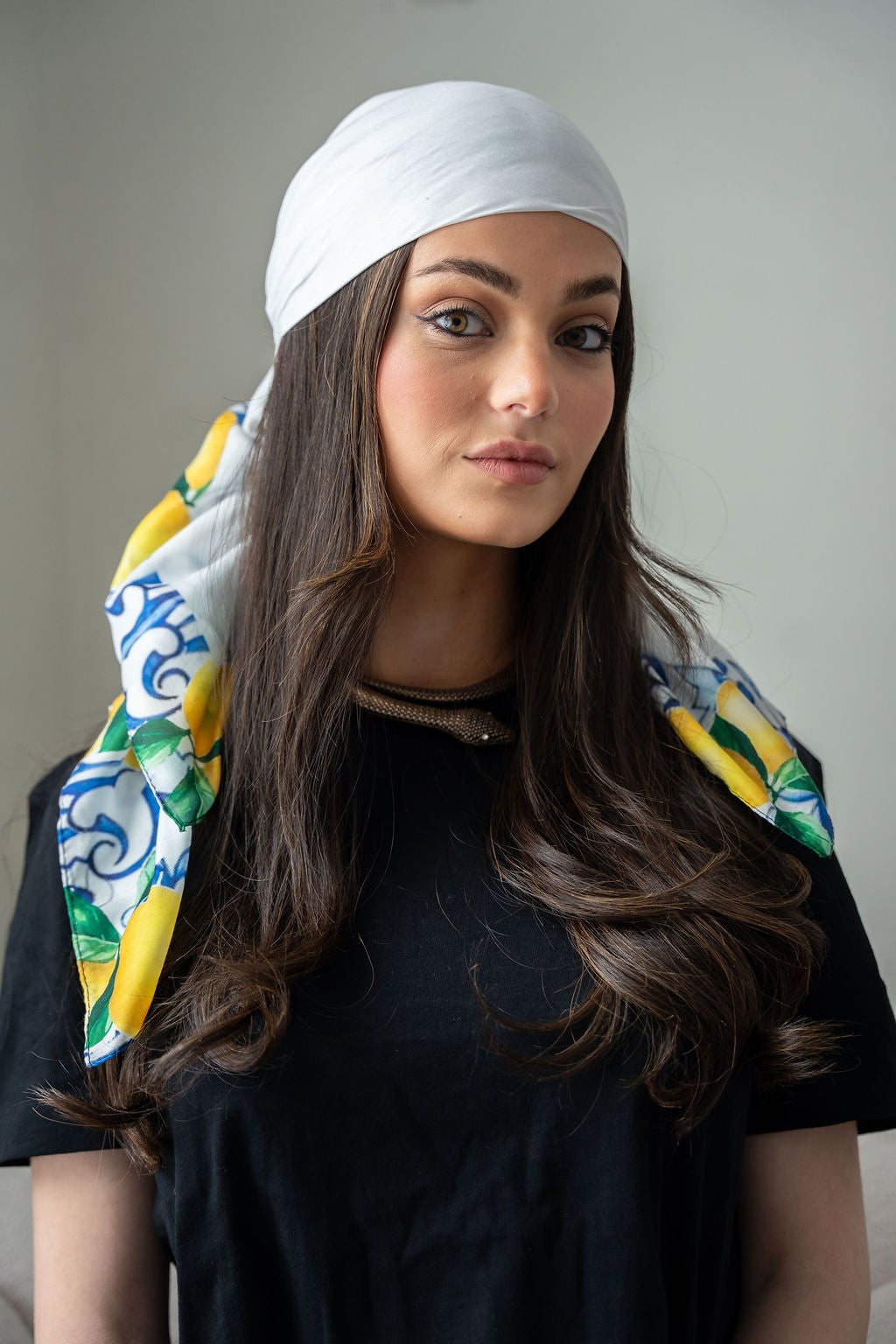 Delicate lemon and floral motifs framed by a bold border print.