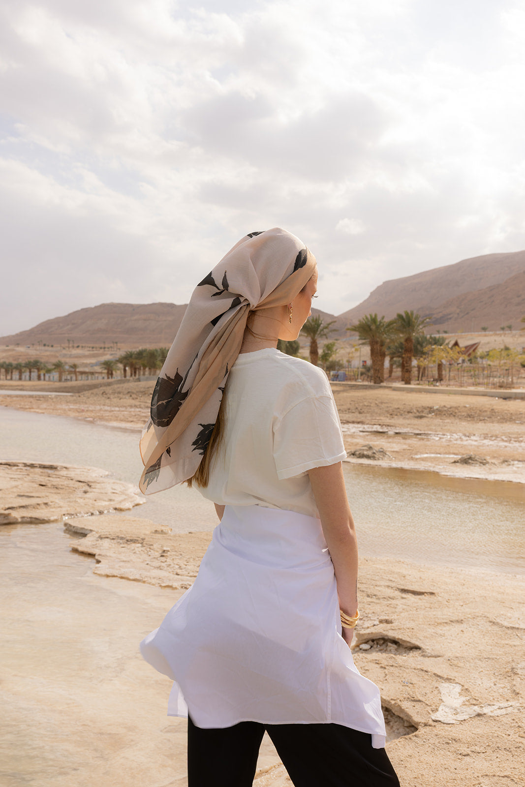 Love, Muted Head Scarf by Tie Ur Knot in a soft neutral floral print, styled elegantly in a serene desert landscape.