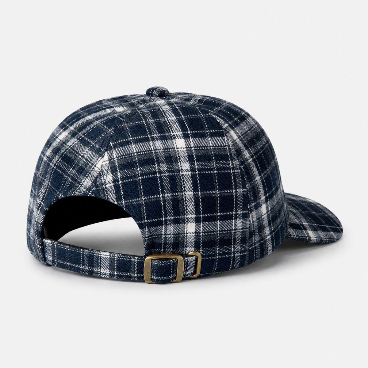 Back view of TUK's Midnight Check Heritage Plaid Cap featuring navy and white checks, a curved brim and adjustable brass buckle.