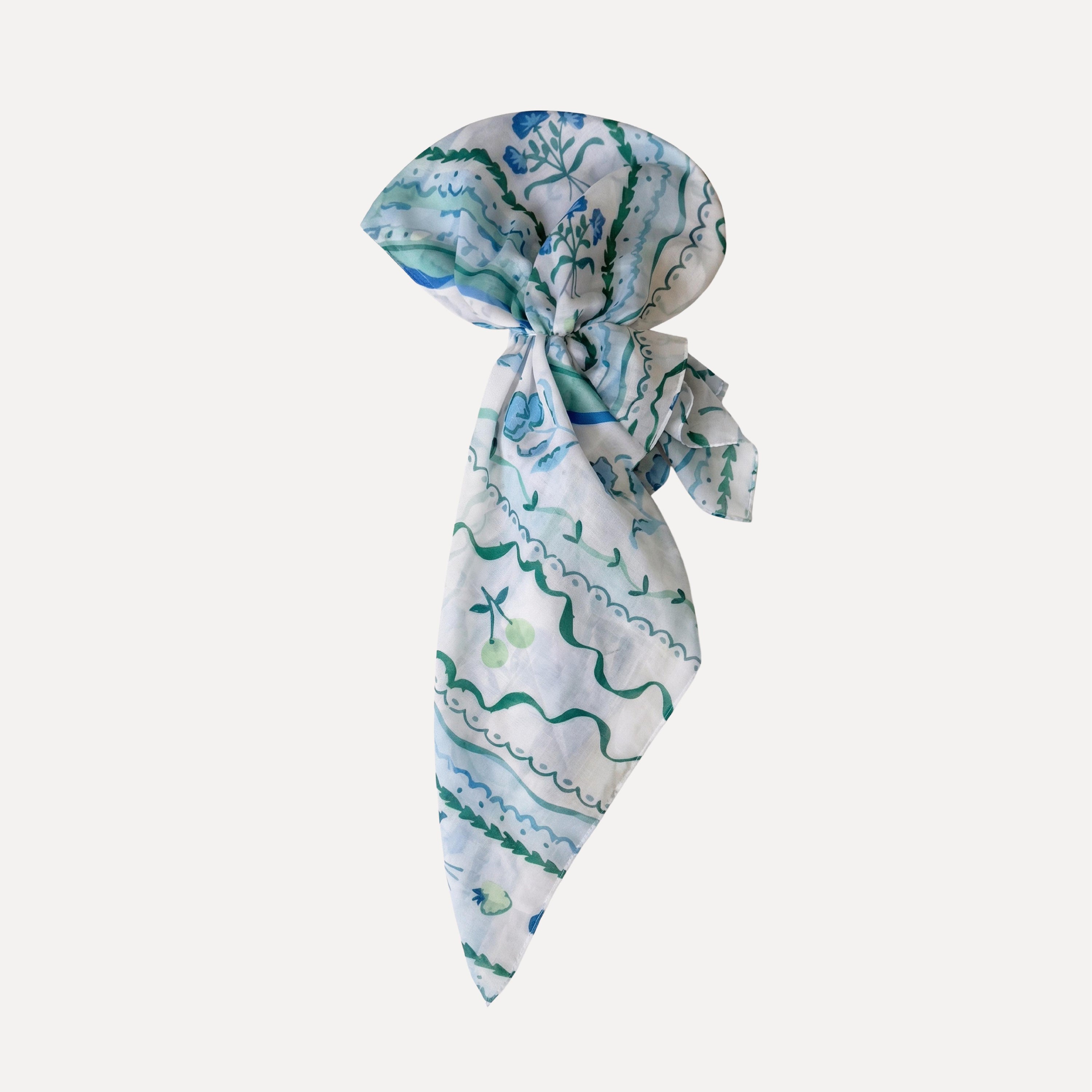 Mint Condition Head Scarf by TUK styled pre-tied, featuring pastel green and blue floral stripes with cherries on soft fabric.