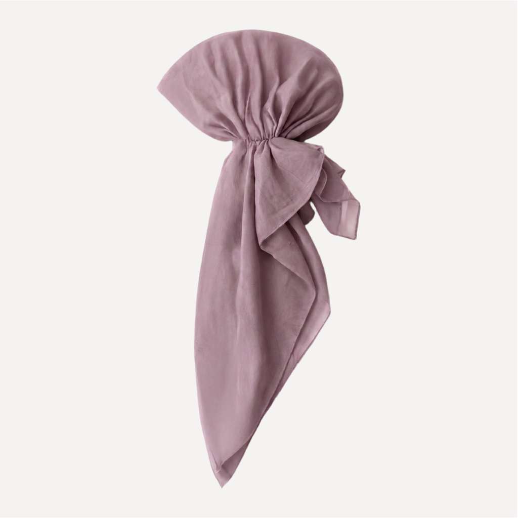 TUK Muted Mauve Solid Head Scarf styled as a pre-tied headwrap in a soft dusty mauve shade with an elegant flowing drape.