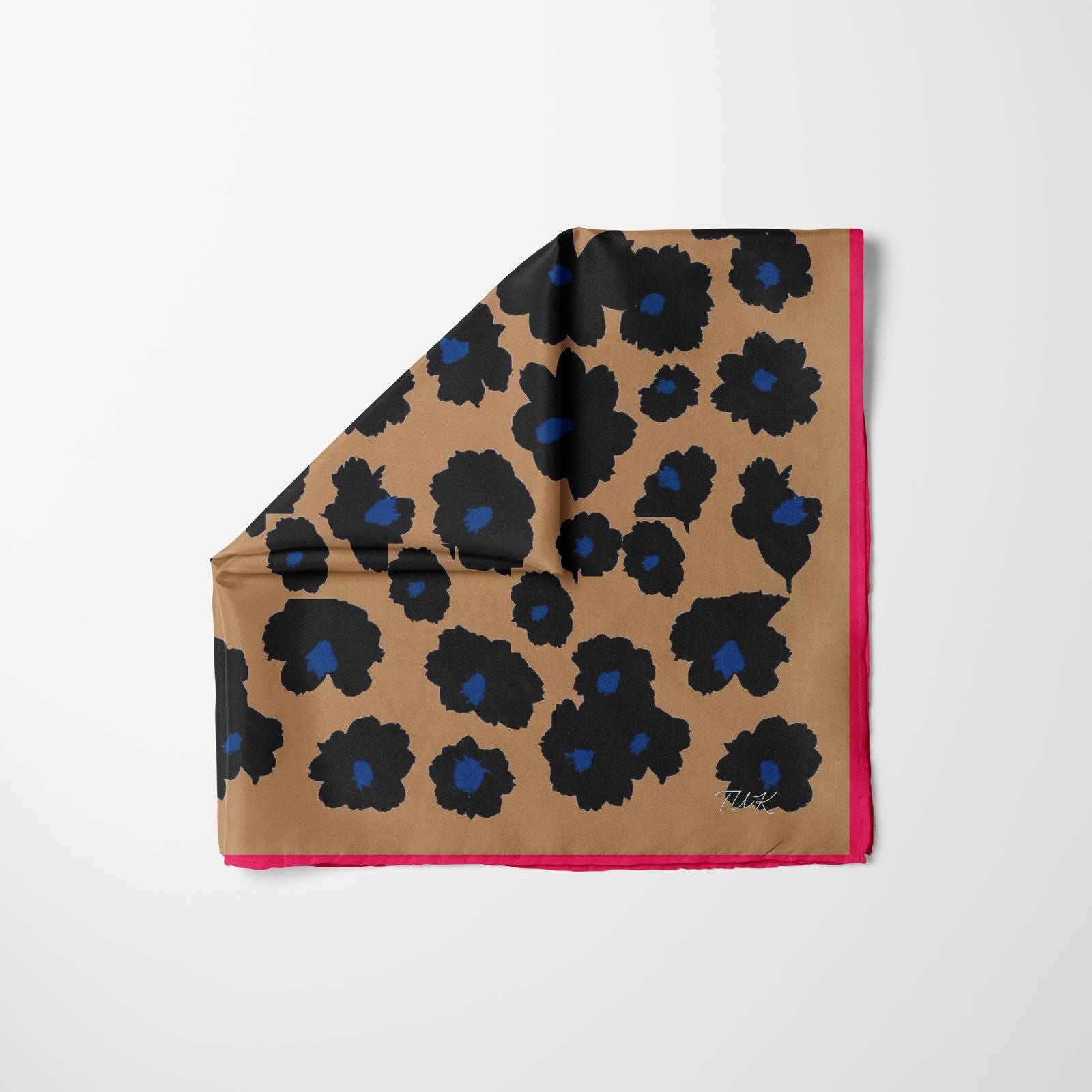 TUK Out Of Line Head Scarf featuring a tan base with bold black floral prints, deep blue centers, and a contrasting pink border