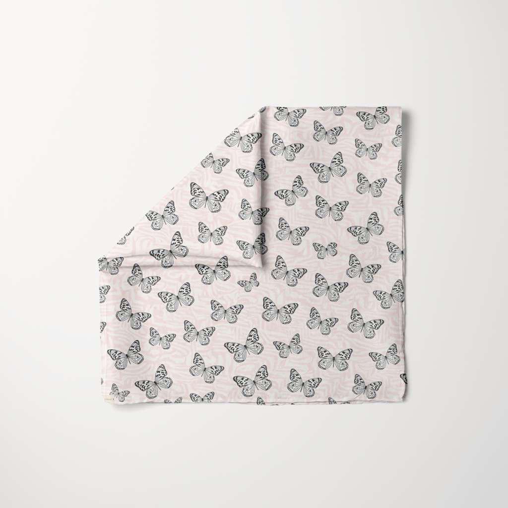Pink Haze Head Scarf with black butterfly print on soft blush pink fabric, lightweight stylish women’s fashion accessory.
