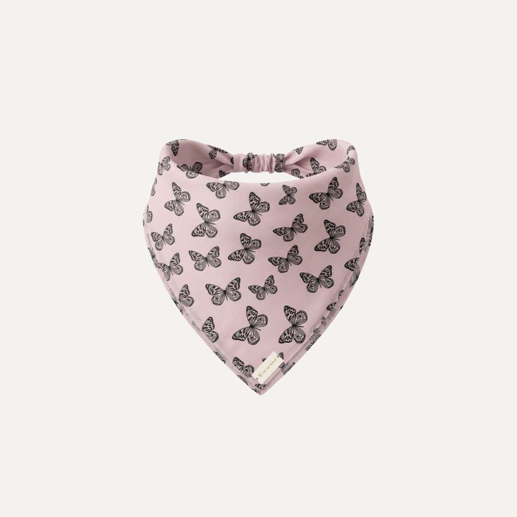 Pink Haze Headband Bandana by Tie Ur Knot featuring a blush pink fabric with black butterfly print and stretchy comfortable fit.