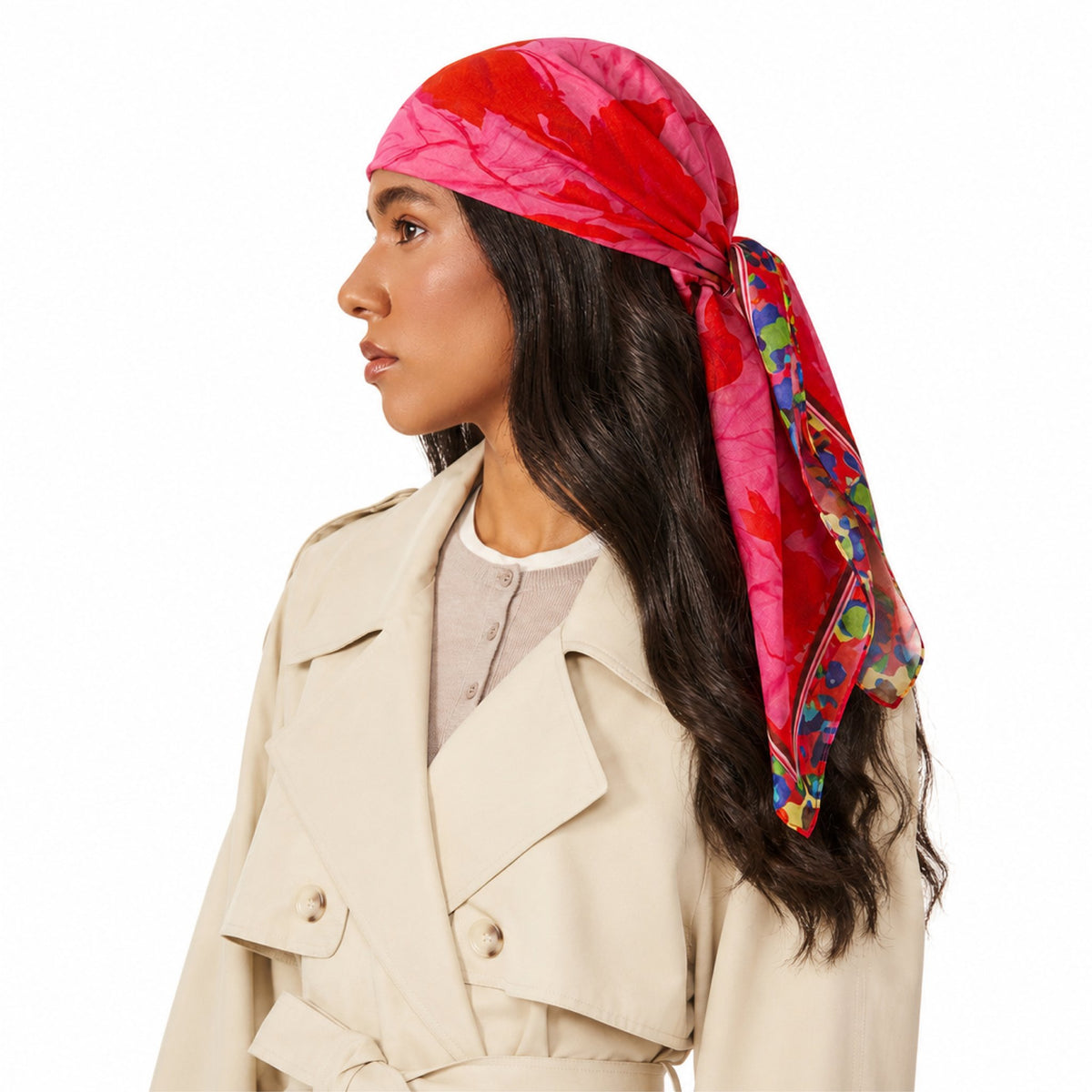 Model wearing TUK Prima Ballerina Head Scarf in pink and red floral print, tied at the back with colorful flowing tails.