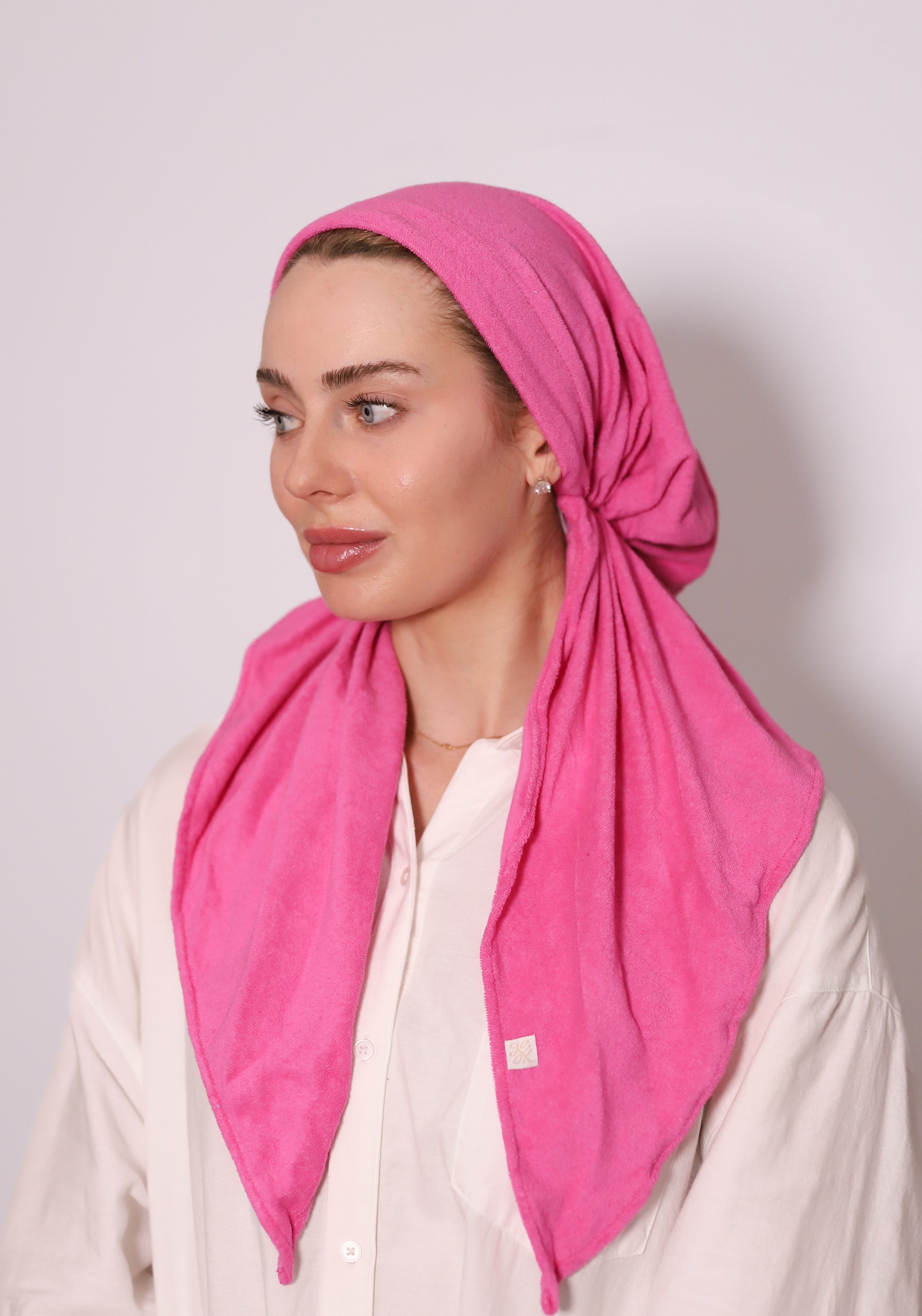 Raspberry Rose Terry Head Scarf in soft pink terry fabric, styled as a modest headscarf with elegant drape and comfortable fit.