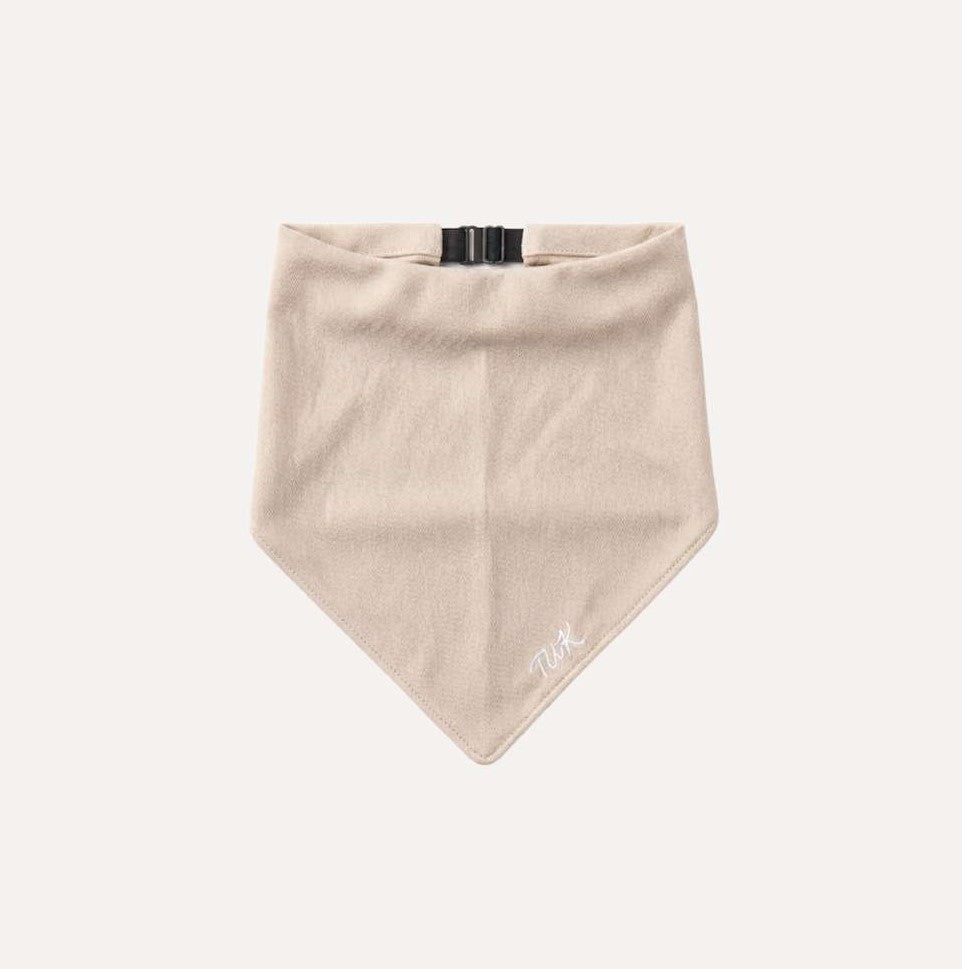 TUK Sand Denim Bandana in warm beige denim with a minimalist design, adjustable buckle closure, and embroidered logo.