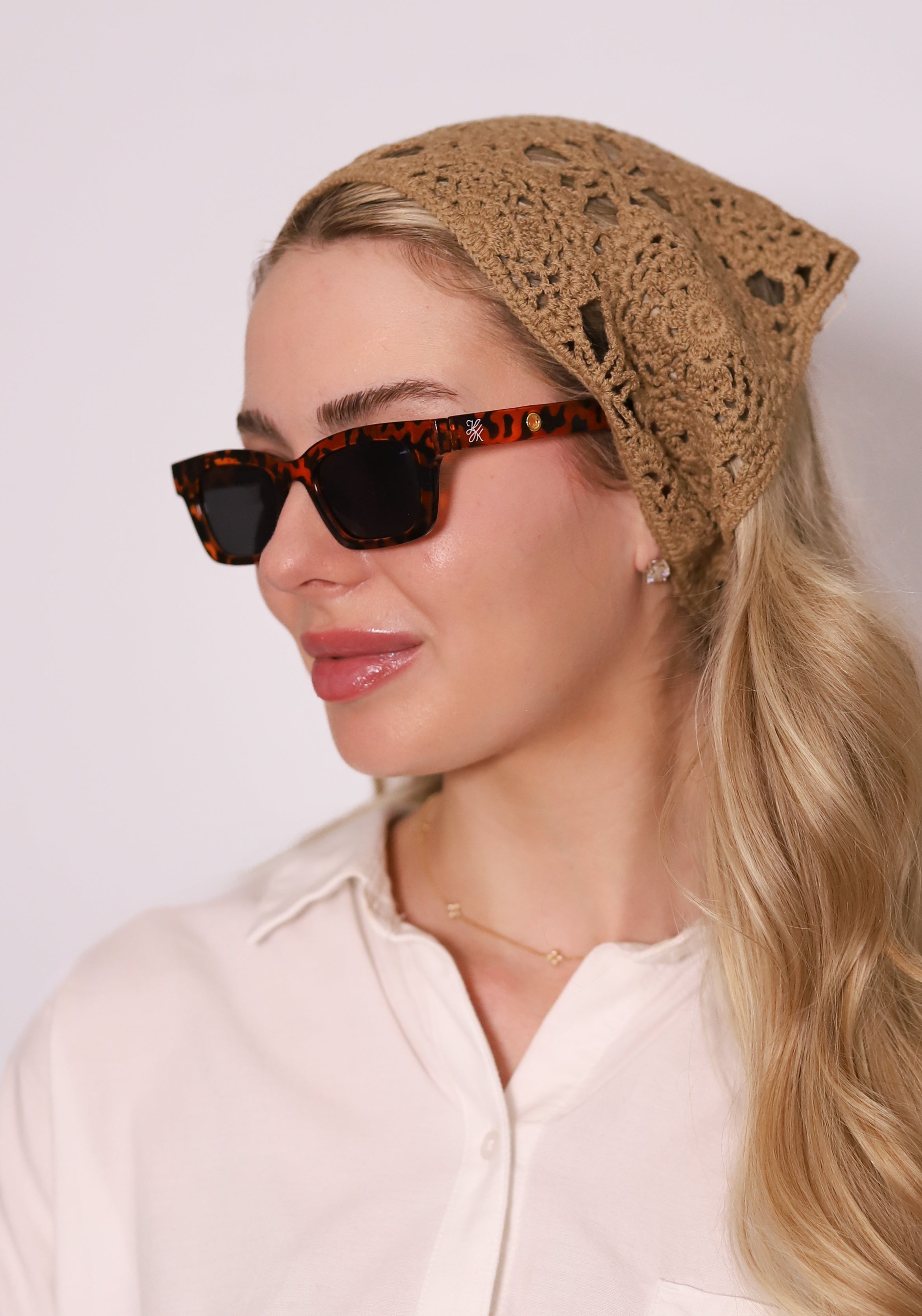 Sloane Sunglasses by TUK in tortoise acetate, styled with a crochet headscarf for a chic, vintage-inspired look.