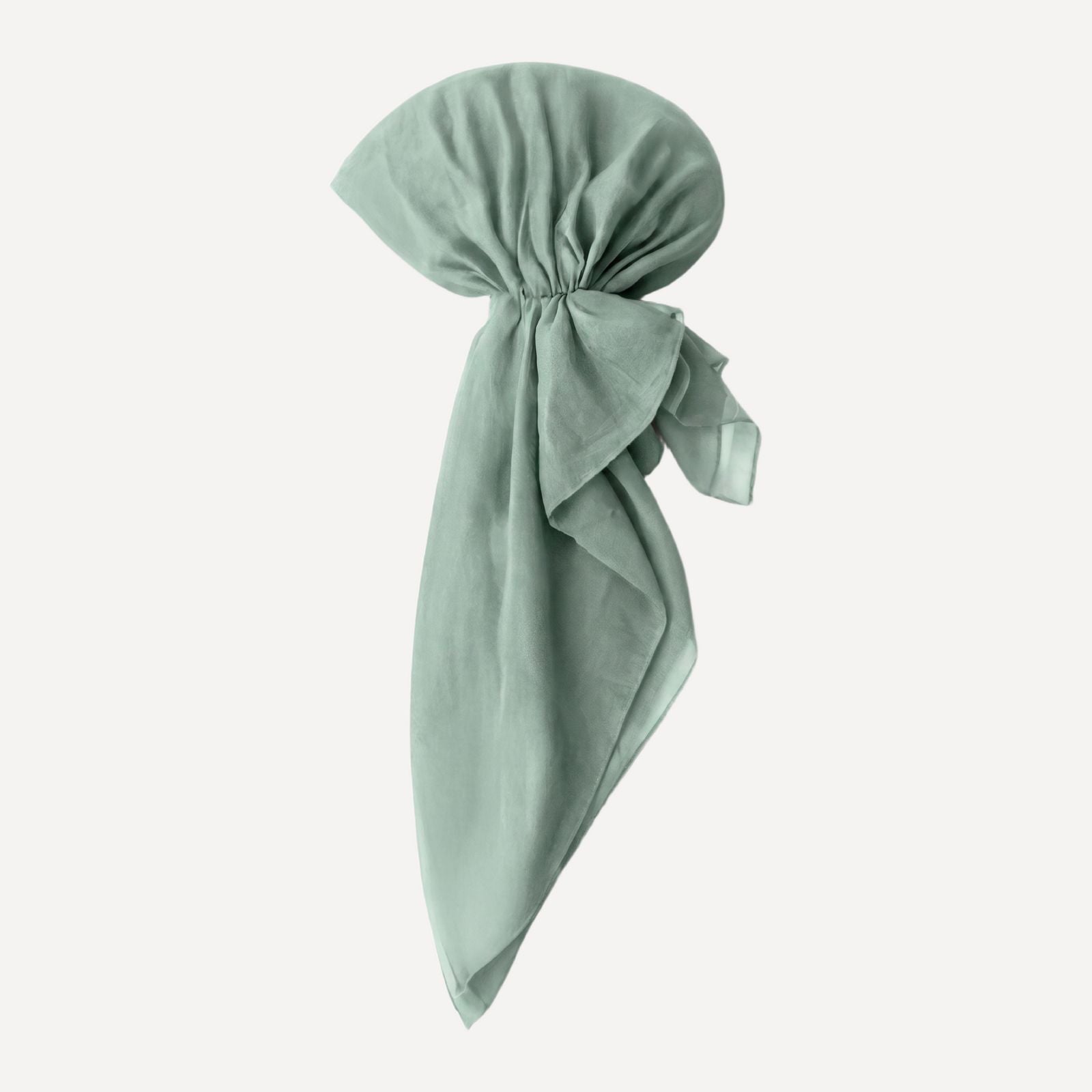 Soft Mint Solid Head Scarf by TUK styled in a pre-tied drape, showcasing a soft pastel mint hue and elegant flow.