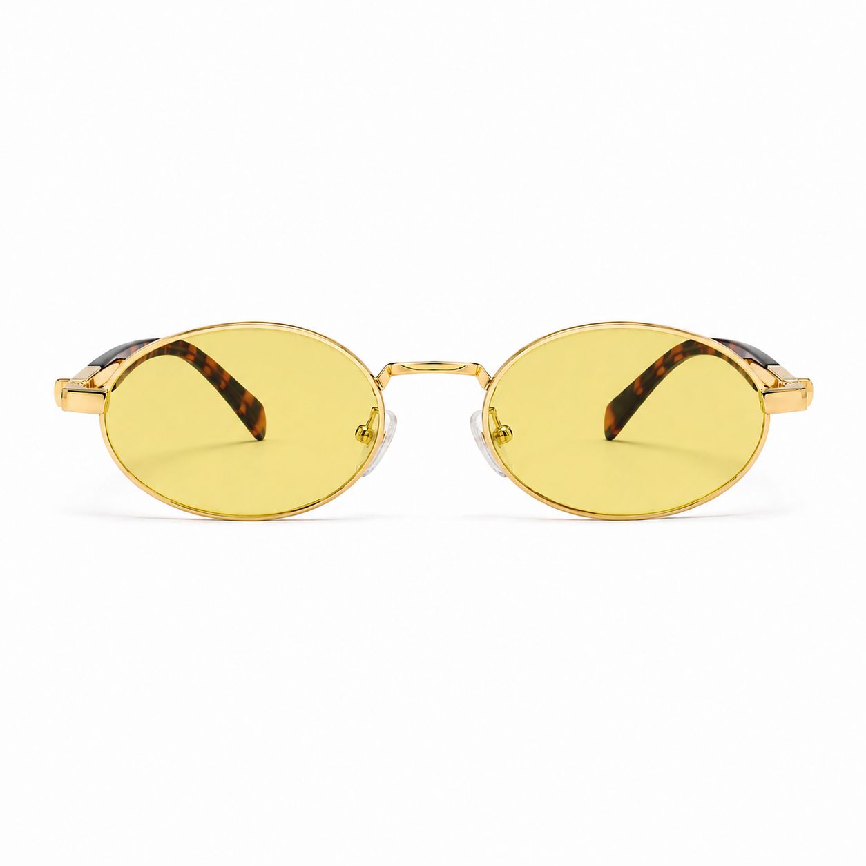TUK Sola Sunglasses with yellow-tinted oval lenses, gold metal frame, and tortoise temples in a sleek retro-inspired design.