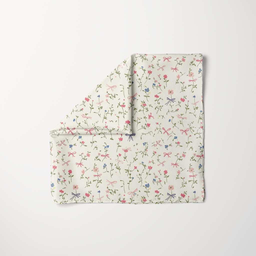 Cream headscarf with pink, blue flowers and bow print, soft spring pattern, lightweight fabric, TUK Spring Thing Head Scarf.