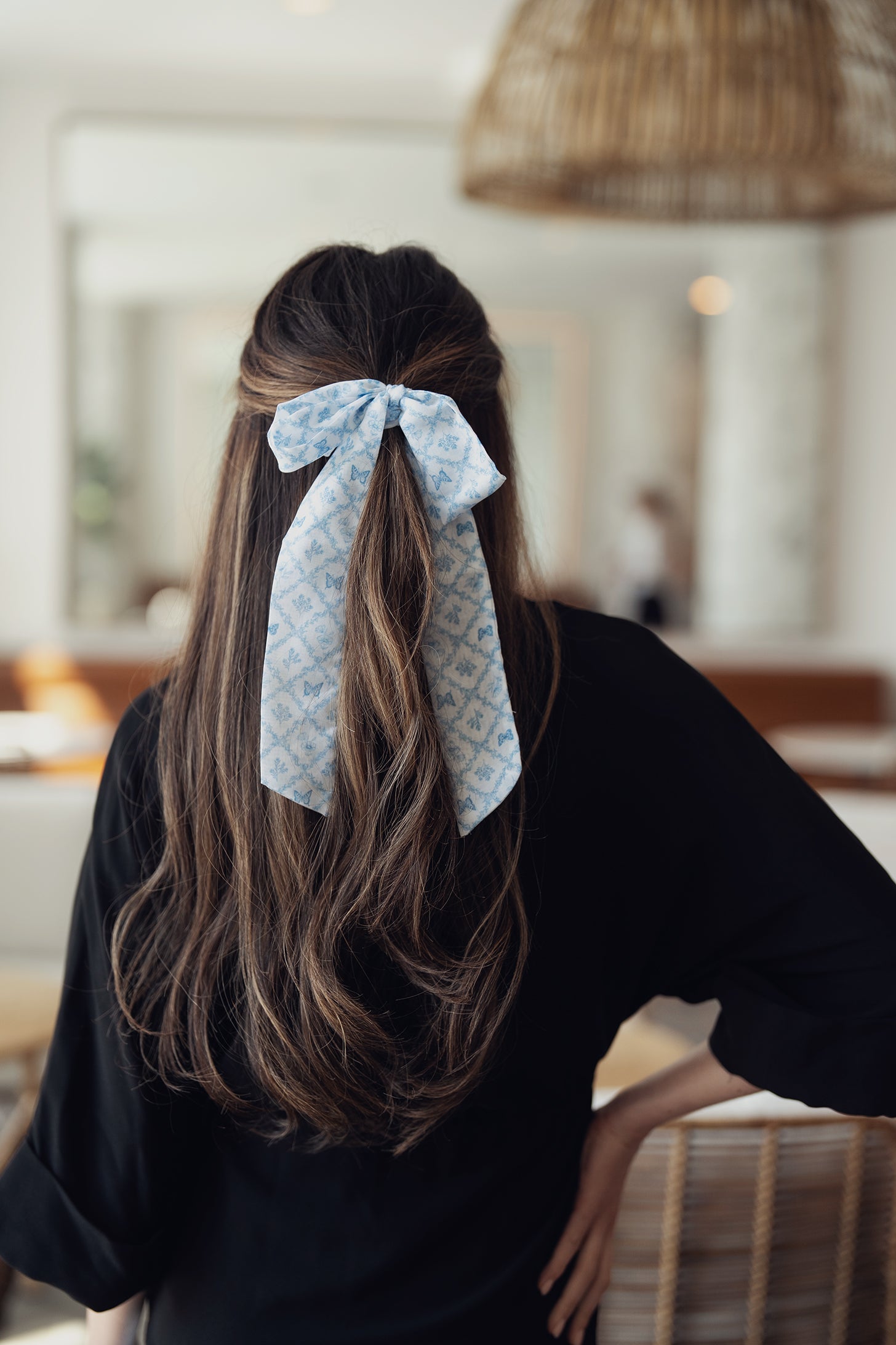 White ribbon with soft blue floral lace print