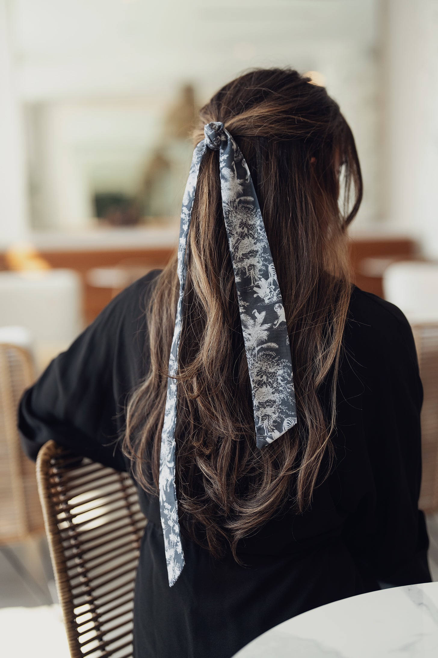 Winter-themed ribbon with toile pattern of zebras and trees
