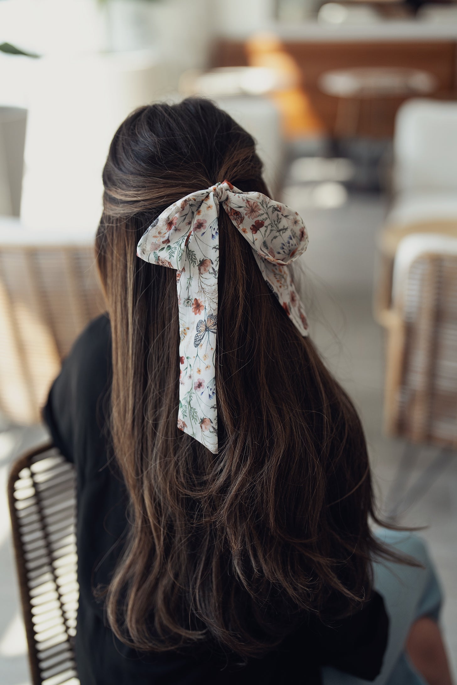Cream-colored ribbon with butterfly and floral print