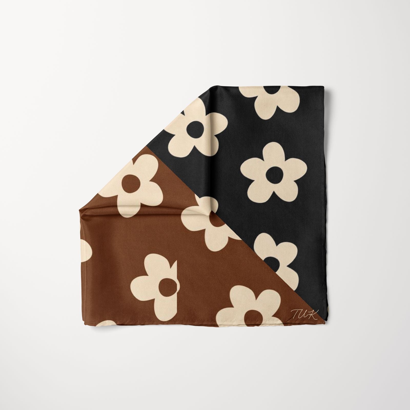 TUK Two Tone Head Scarf with bold black and brown panels, accented by cream floral prints for a chic, modern and versatile style.