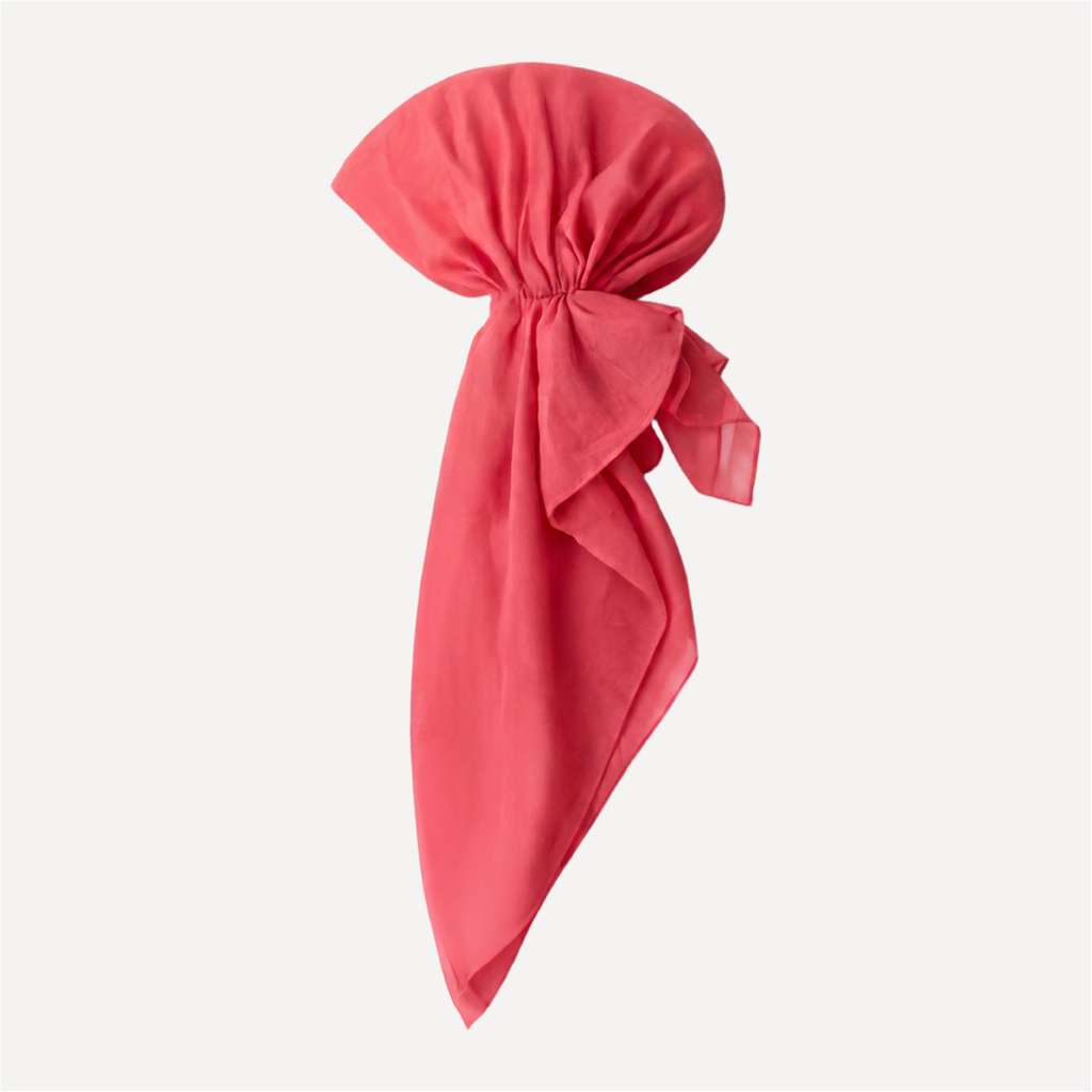 Warm Coral Solid Head Scarf pre-tied style in lightweight fabric, featuring a soft drape, elegant bow detail, and vibrant coral hue.