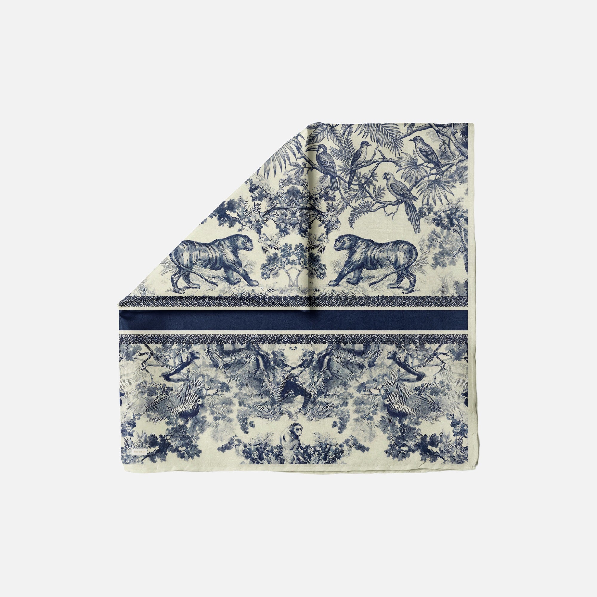 TUK Wild Toile Head Scarf in navy and ivory, featuring mirrored tigers, tropical birds, botanical foliage and striped border.