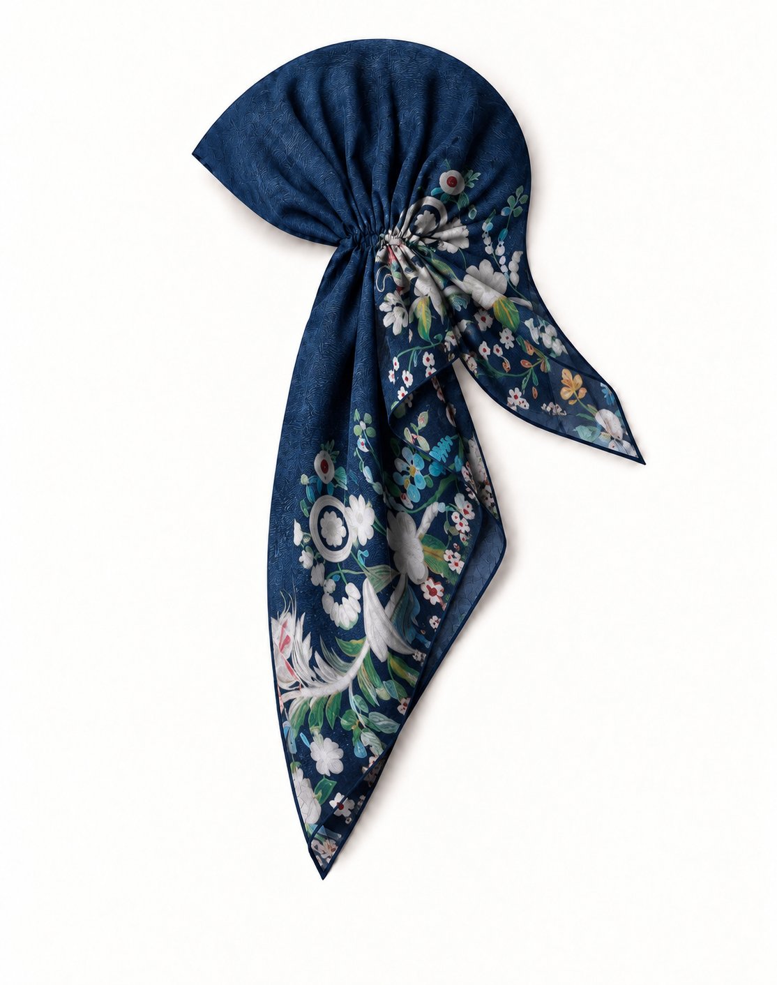 TUK Good Genes Head Scarf in navy blue, styled with flowing tails and delicate white, pink, and green floral prints on the edges.