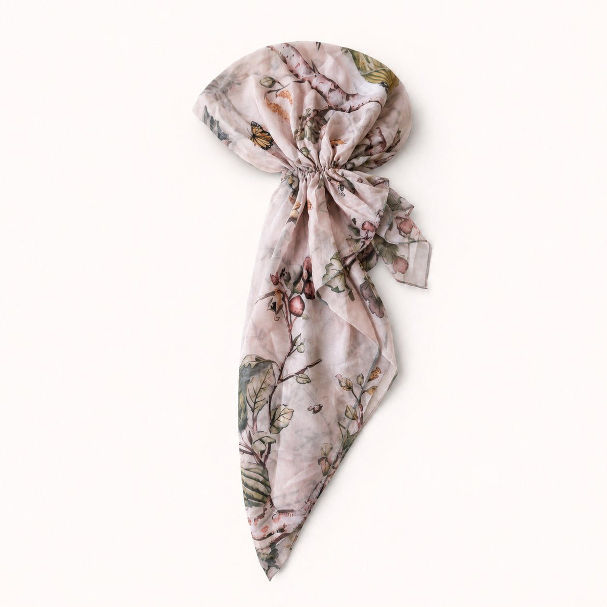 TUK Perch Perfect Head Scarf styled in a pre-tied bow, featuring woodland birds, butterflies, and leafy prints on soft cream.